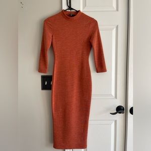 Burnt orange mock-neck mid- length sweater dress.